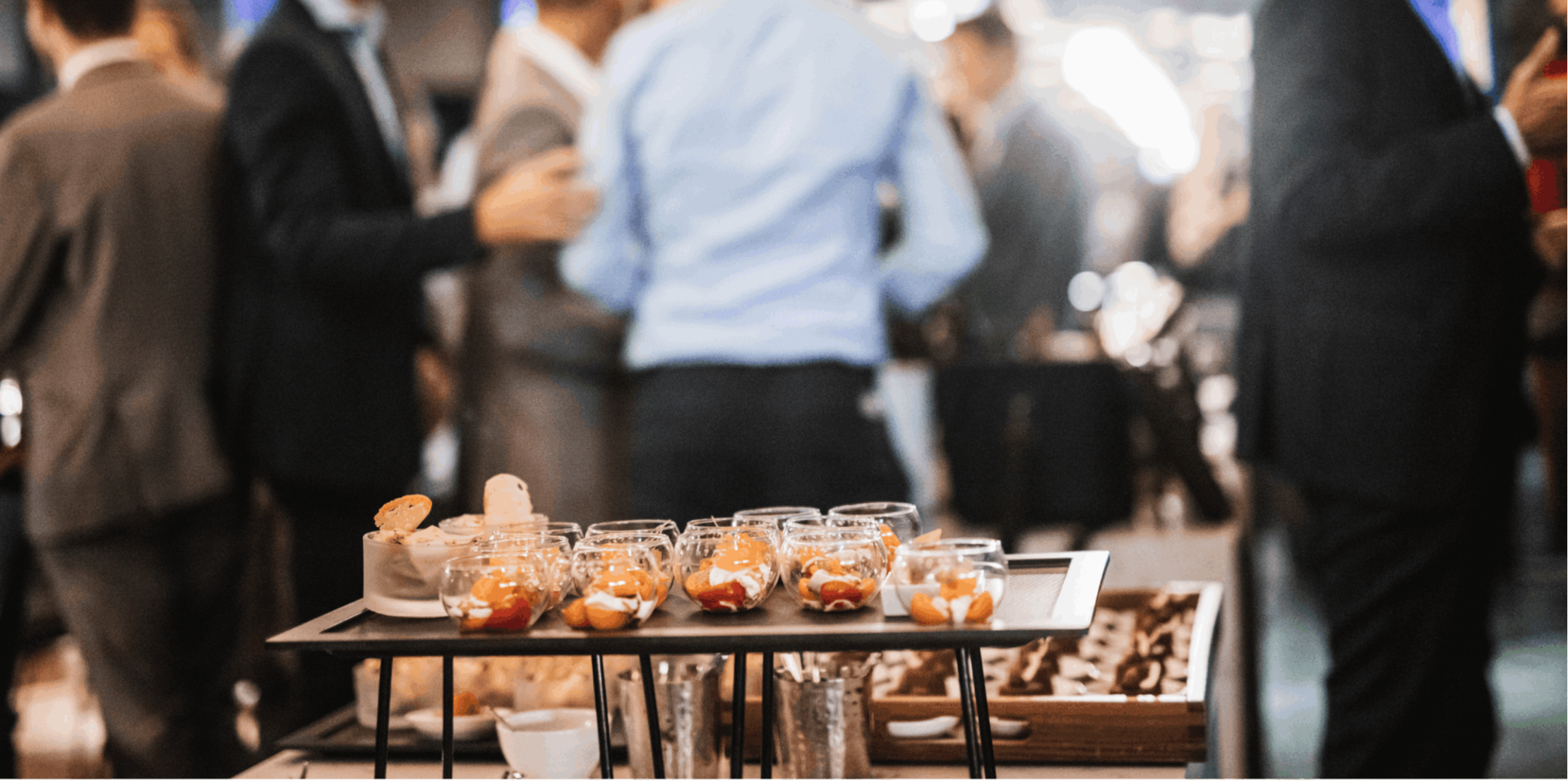Corporate delegates networking at a canapé reception — professional event management, catering coordination and delegate experience delivered