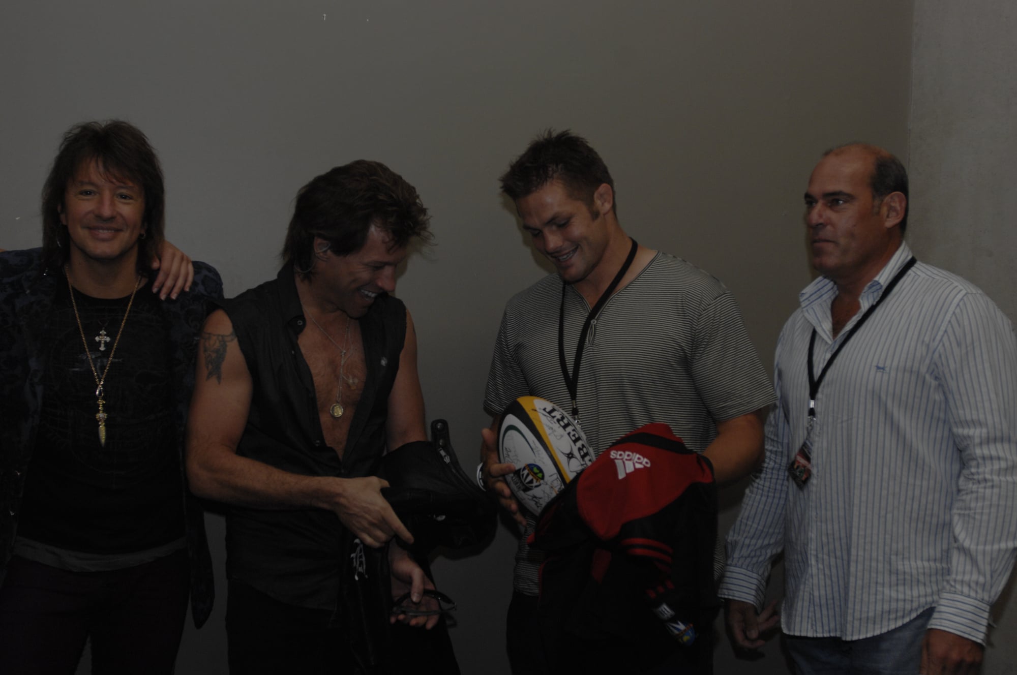 Backstage gift presentation from Richie McCaw to Bon Jovi in Christchurch.