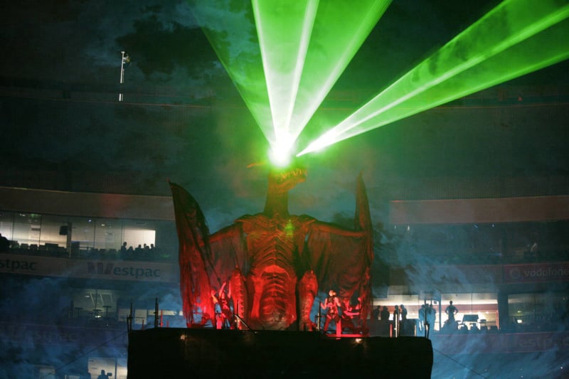 Giant Weta Workshop Dragon stage prop with green laser effects during Rock2Wgtn at Westpac Stadium in Wellington.