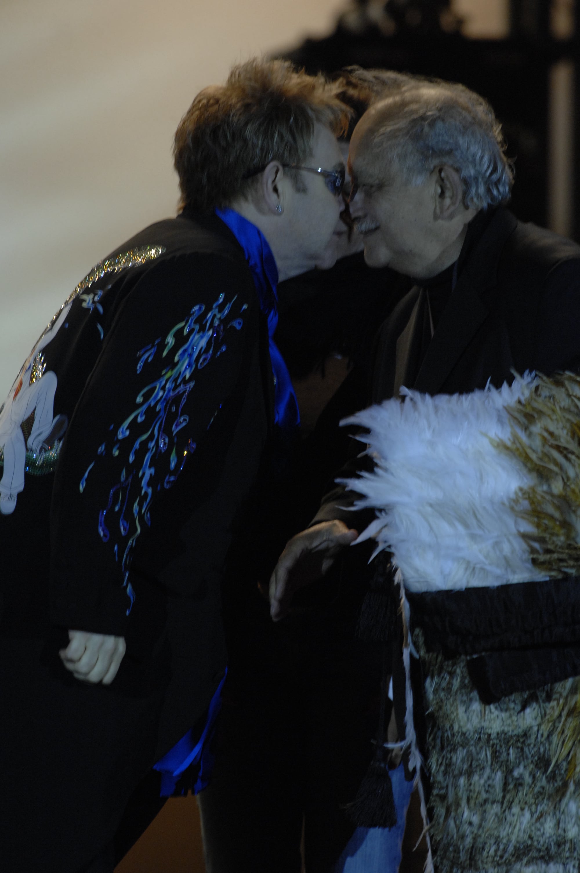 Elton John wearing a korowai during an on-stage presentation by Te Āti Awa at Bowl of Brooklands in New Plymouth.